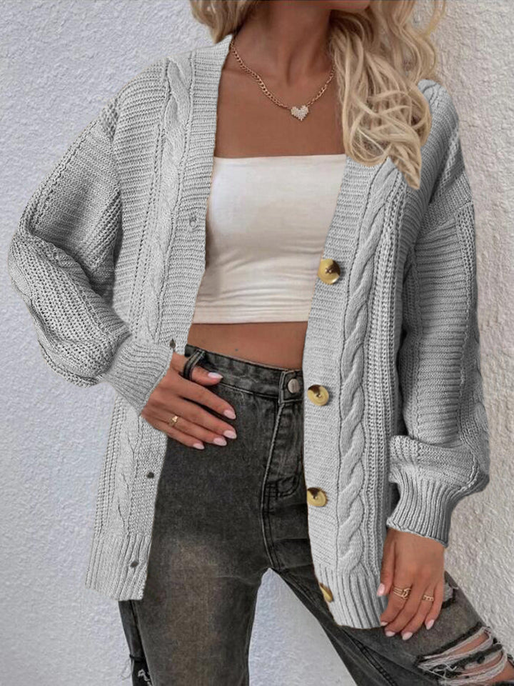 Ladies oversized knit cardigan with button details and cable pattern Lune London