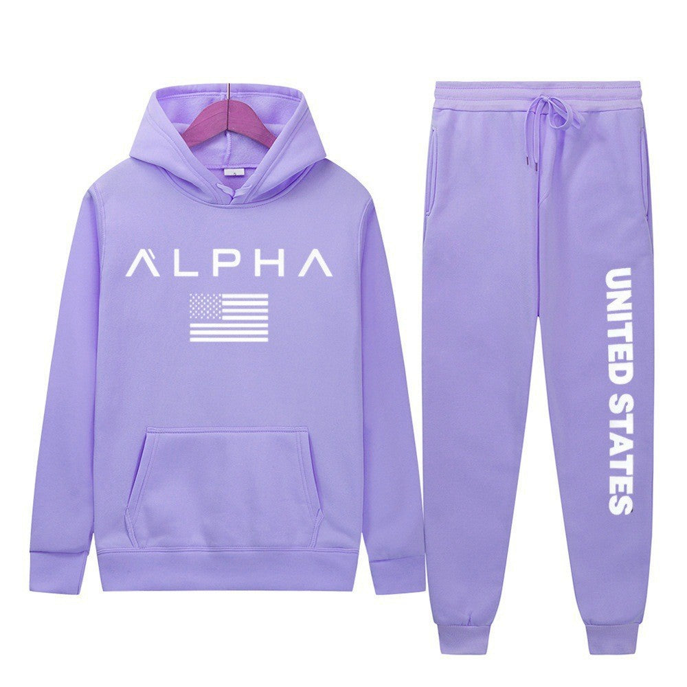Women's hoodie and jogging pants set with creative front print and sporty cut Chic & Stil