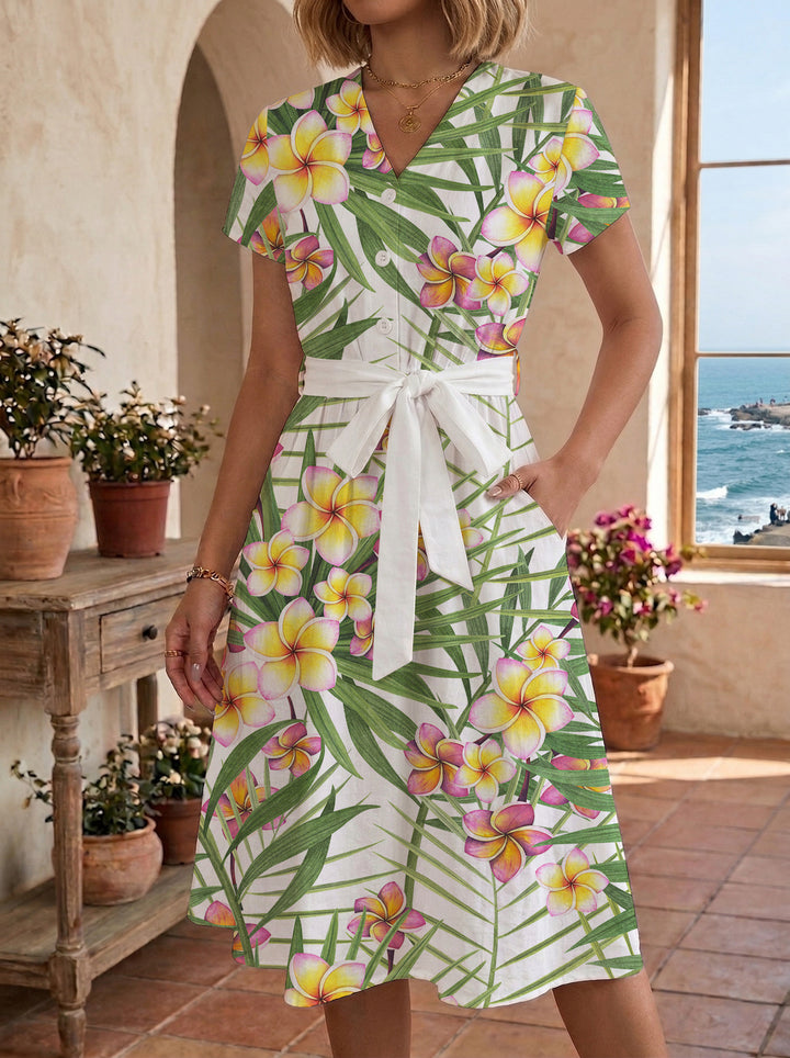 Women’s midi dress with colorful floral design and adjustable tie belt Lune London