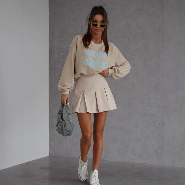 Mode femmes pull et jupe plissée ensemble Chic & Stil