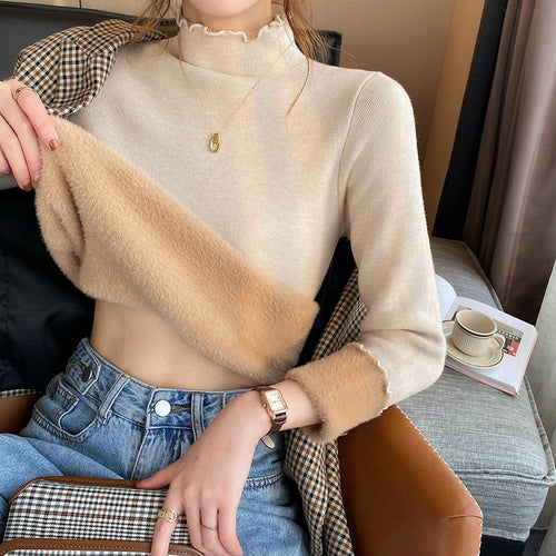 Pull court femme avec col roulé et détails à volants Chic & Stil
