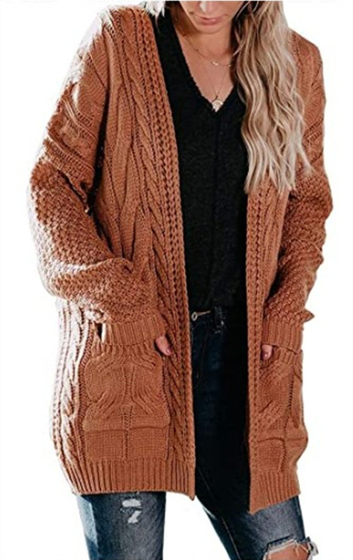 Thick knit jacket for women with deep pockets and textured cable pattern Lune London