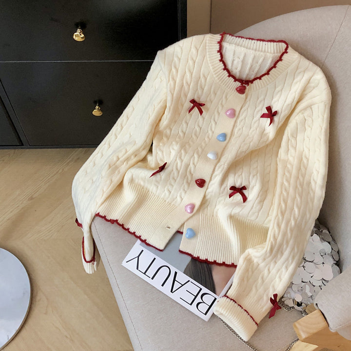 Cardigan en tricot épais pour femmes avec des détails de boutons ludiques et des nœuds