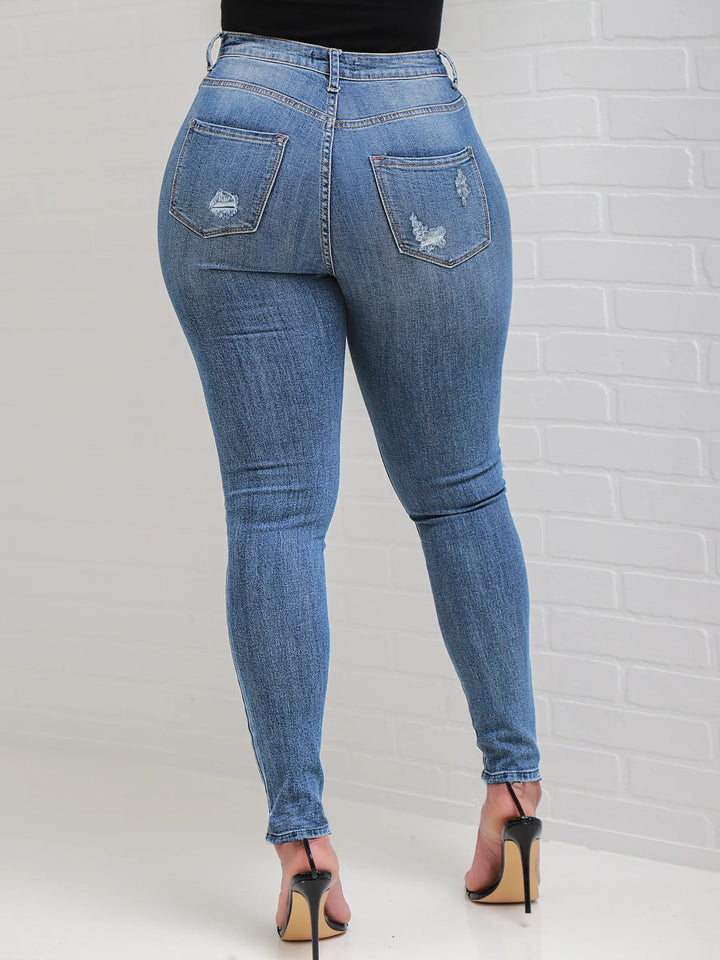 Women High-Waisted Sculpting Skinny Jeans with Visible Button Placket and Subtle Destroyed Detail Amarae
