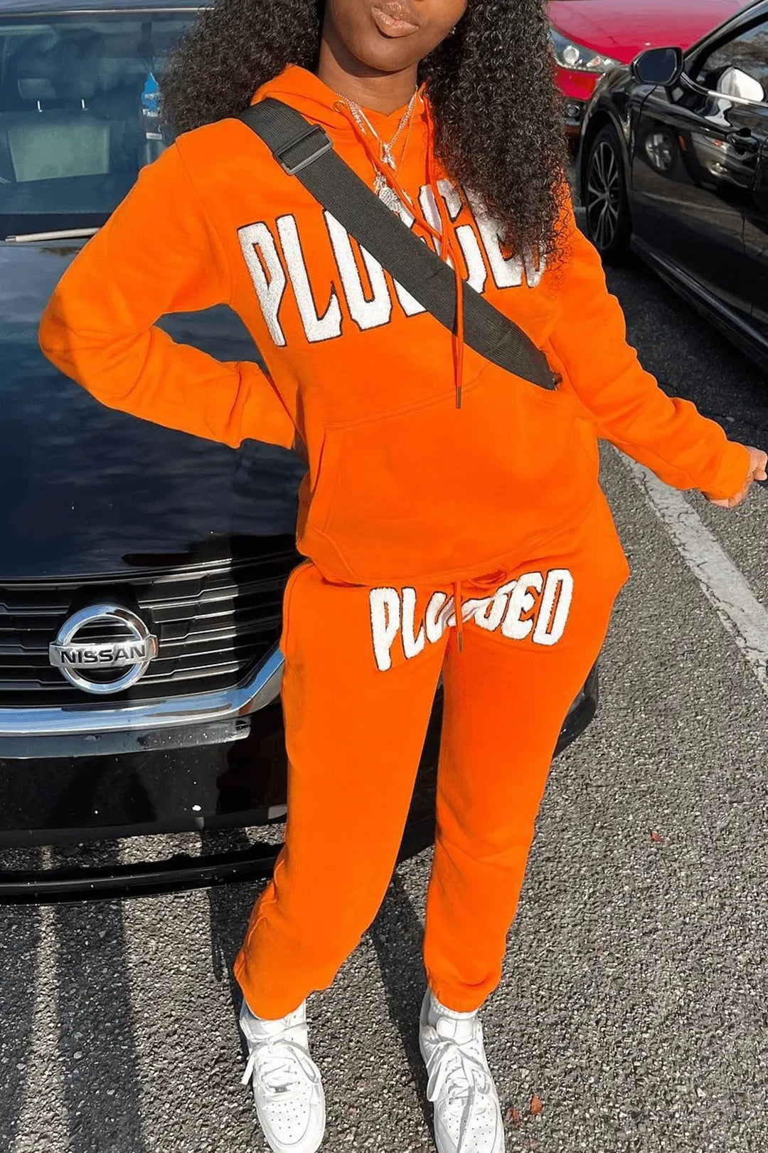 Women's plush hoodie and jogger set with catchy inscription Lune London