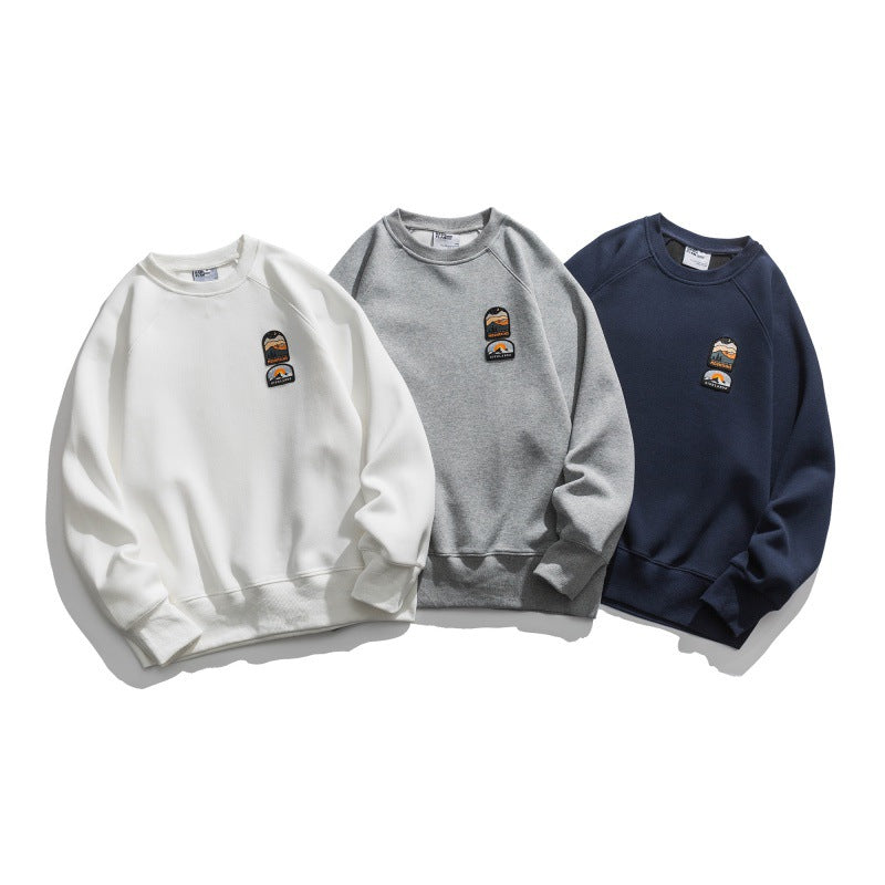 Unisex Oversize Sweatshirt with raglan sleeves and mountain patch Amarae