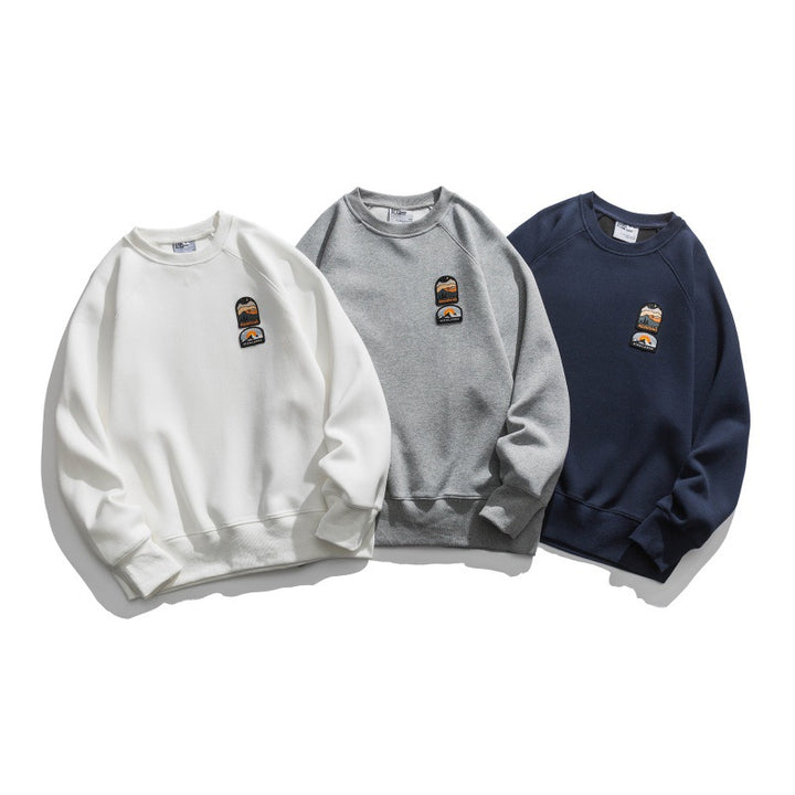Unisex Oversize Sweatshirt with raglan sleeves and mountain patch Amarae