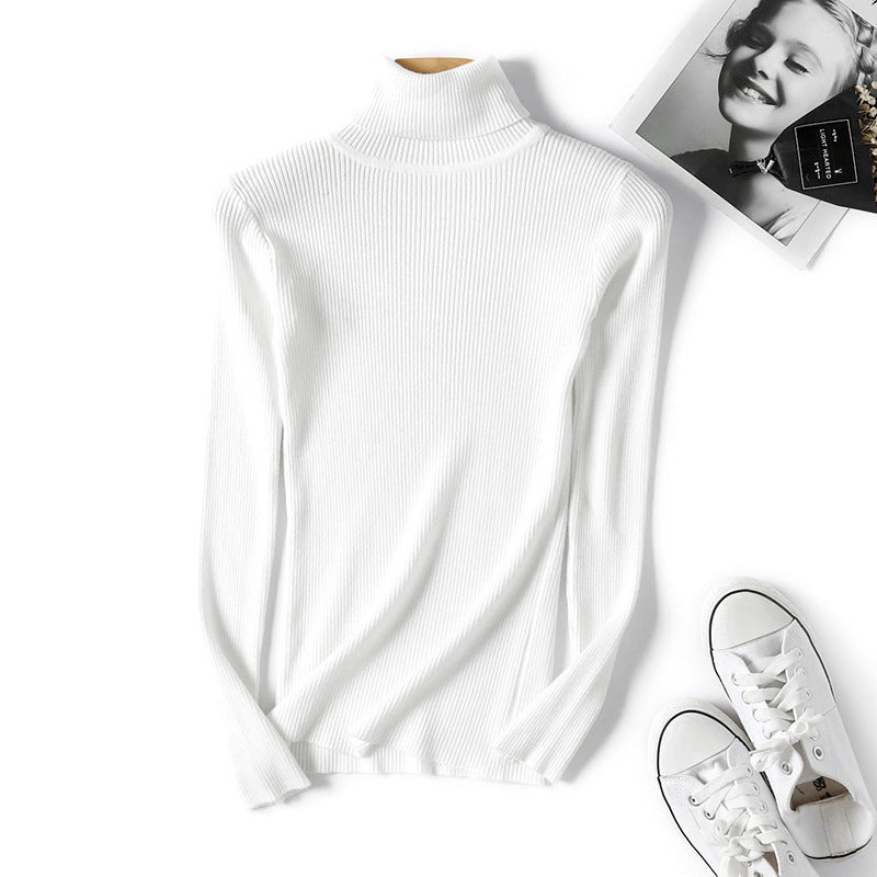 Women's turtleneck sweater with a fine ribbed texture and a fitted cut Lune Londonl