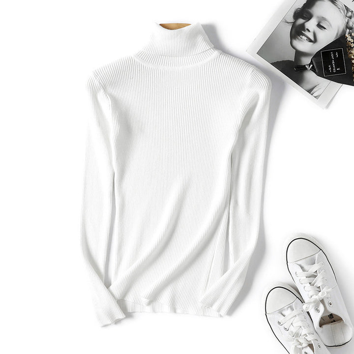 Women's turtleneck sweater with a fine ribbed texture and a fitted cut Lune Londonl