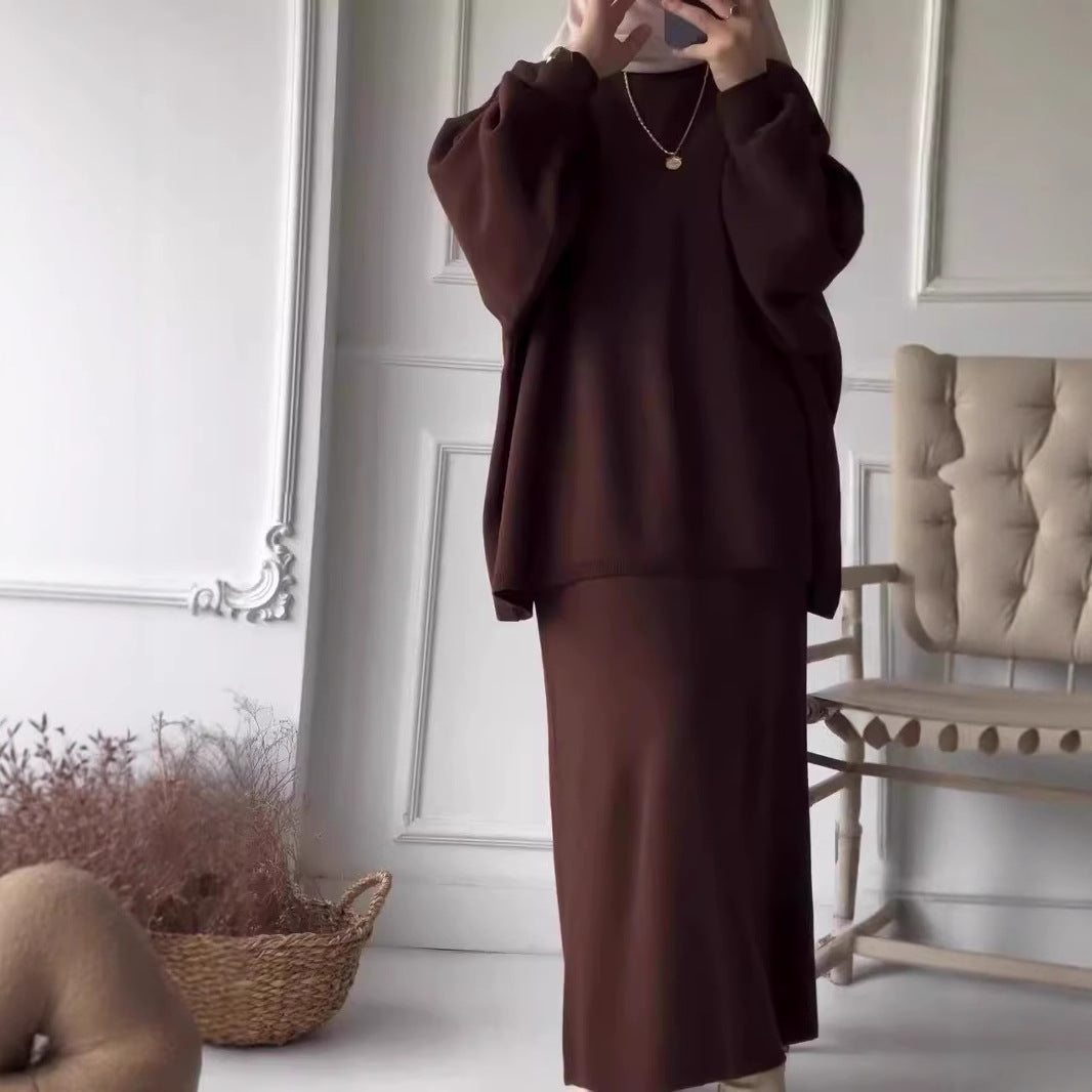 Elegant set for women made up of a casual sweater and a chic midi skirt.