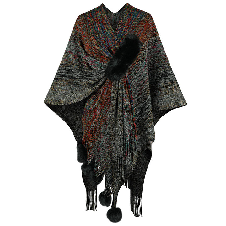 Ladies fashionable poncho with luxurious faux fur trim and creative fringes Lune London