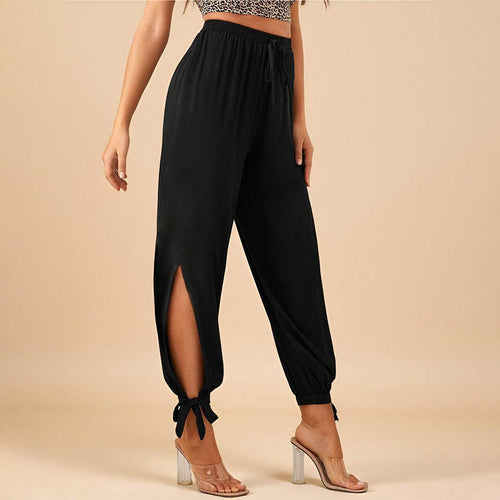 Chic & Stil Elegant women's trousers with side slits and drawstring