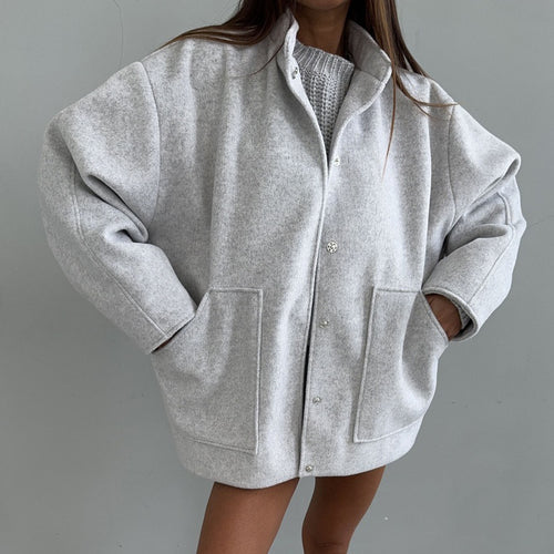 Oversized wool coat for women with simple button details and practical pockets Amarae