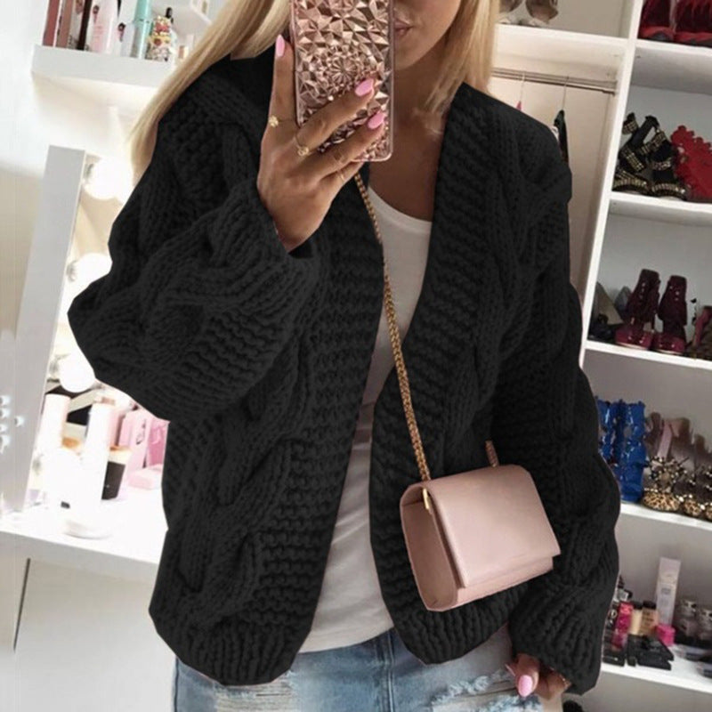 Women’s knit jacket with a chunky cable knit pattern and a loose fit Lune London