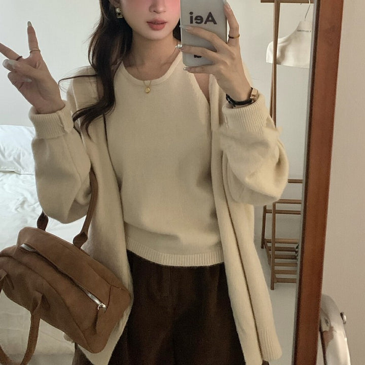 Pull en maille pelucheuse pour femme avec coupe décontractée et manches ouvertes Chic & Stil
