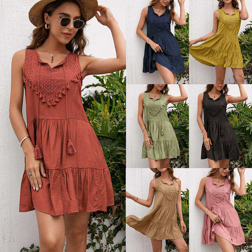 Sleeveless women's dress with crochet and pompom accents Lune London