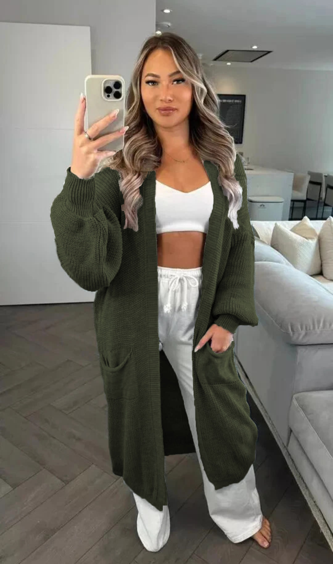 Casual knitted coat for women with deep pockets and open design Lune London