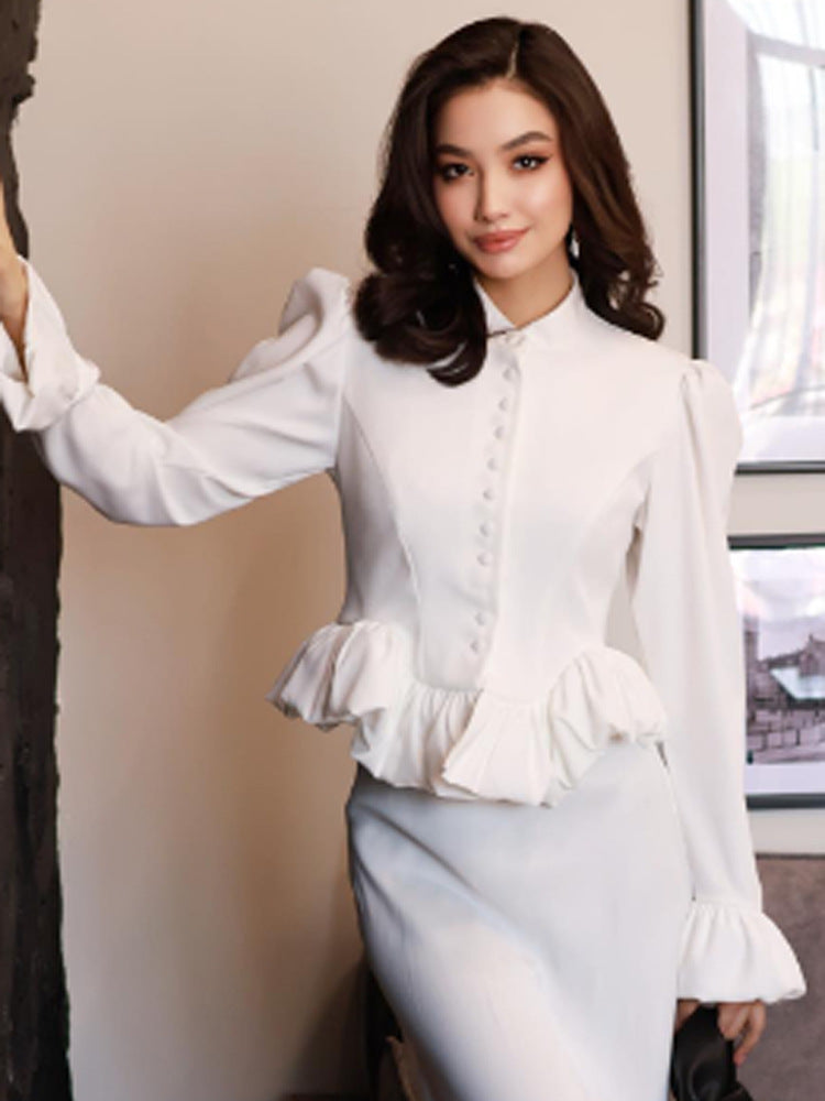 Ladies tailored peplum blouse with stand-up collar, covered button placket and puff sleeves Amarae