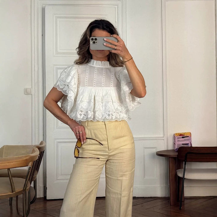 Women's lace blouse in cropped ruffle style with standing collar and layered ruffles