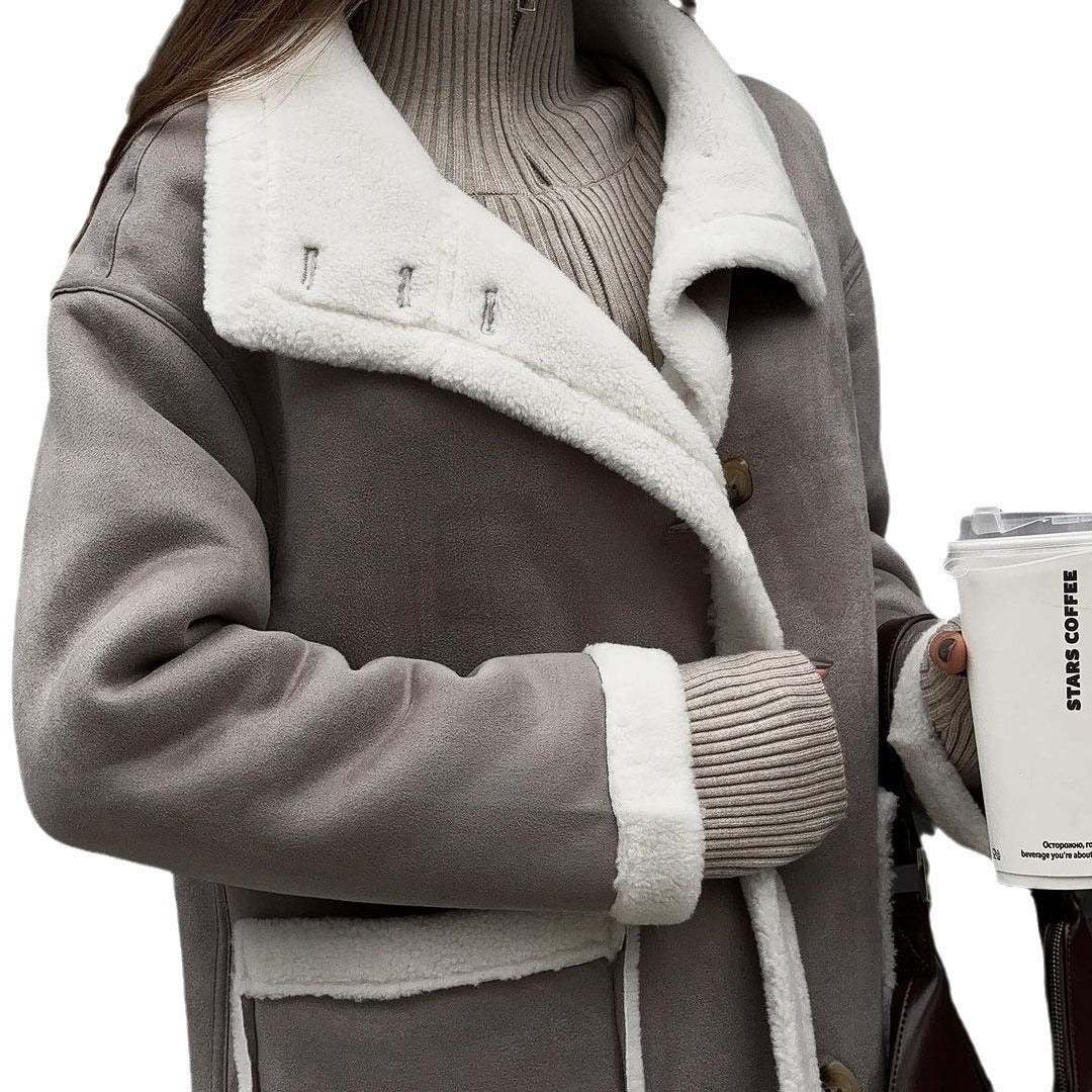 Ladies elegant and warm fleece coat with oversized cut and stylish button placket