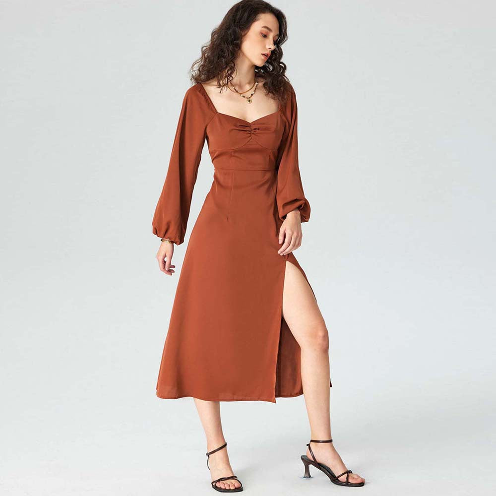 Robe midi pour femmes avec des manches bouffantes raffinées et une haute fente Chic & Stil