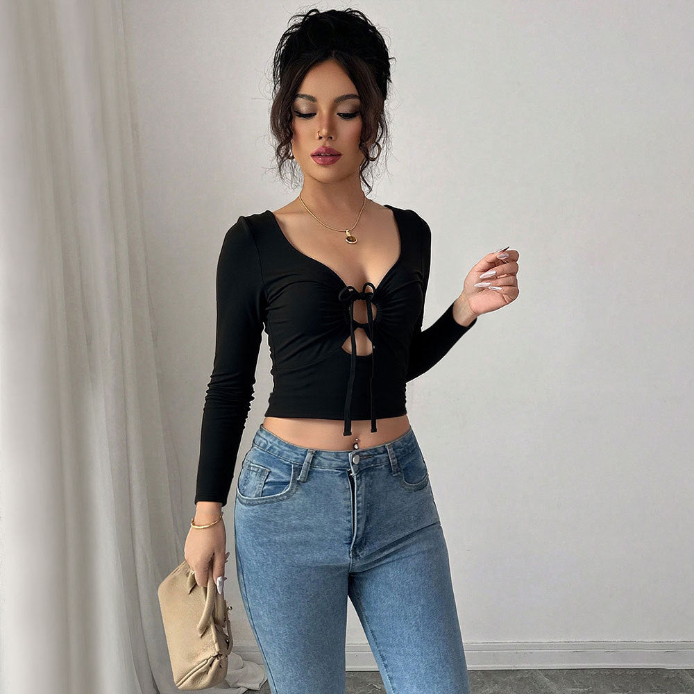Short top for women with decorative knot and long sleeves Chic & Stil
