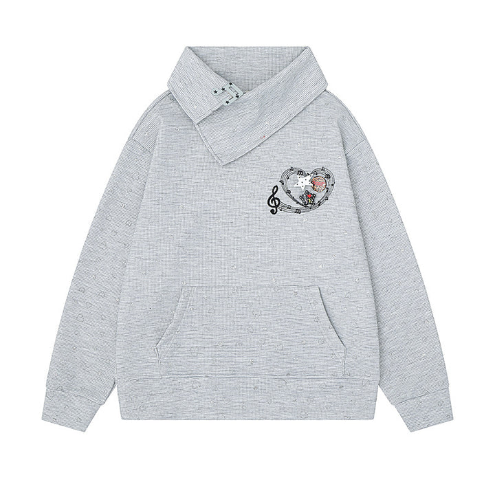 Women’s oversized sweatshirt with asymmetrical stand-up collar, kangaroo pocket and musical heart embroidery Amarae