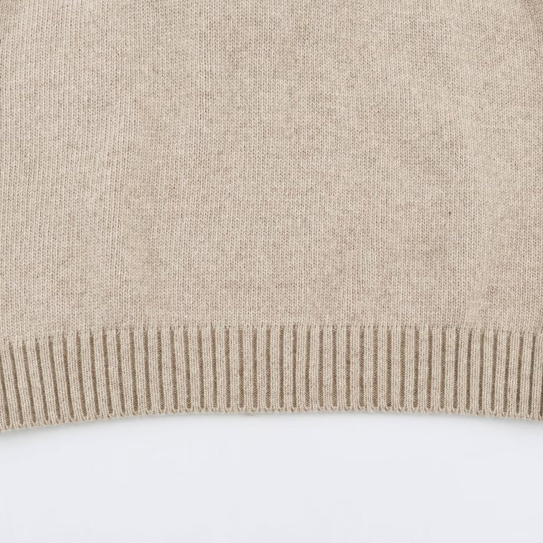 Women's fine knit vest with hood, button placket, and ribbed waistband Amarae