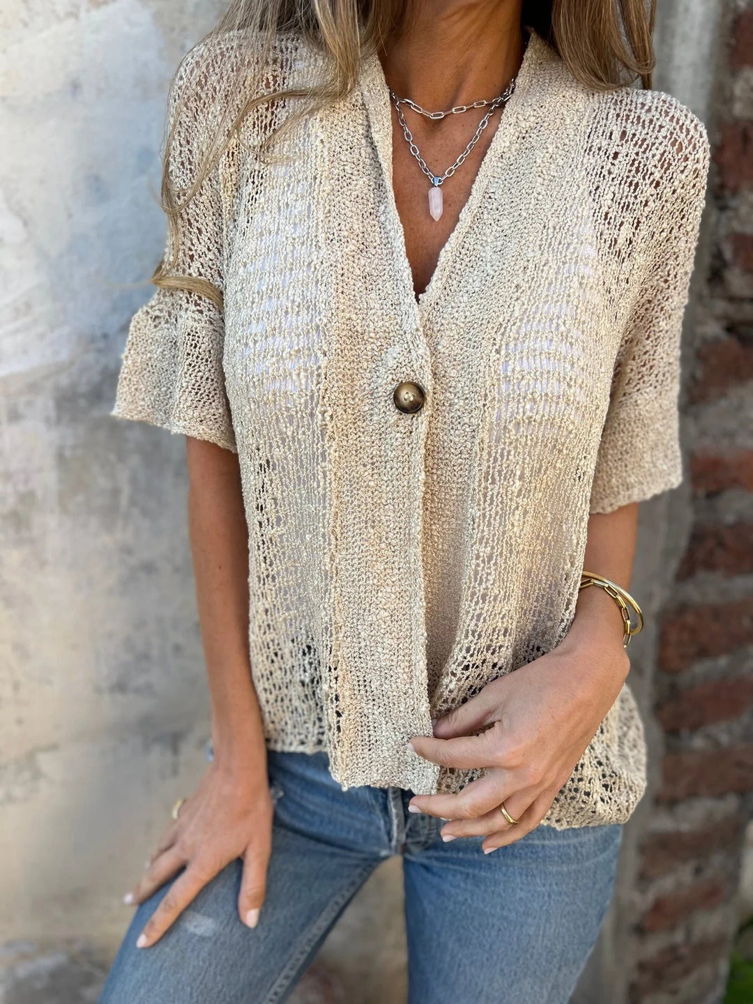 Lightweight knitted jacket for women with elegant button placket Lune London