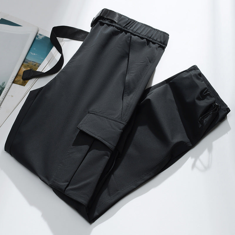 Men's cargo joggers with elastic waistband, drawstring, adjustable leg cuffs, and patch pockets.
