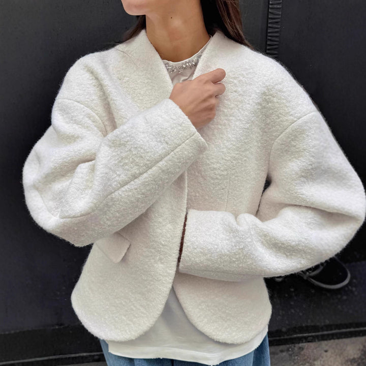 Lune London elegant boucle jacket for women with geometric cut and raglan sleeves