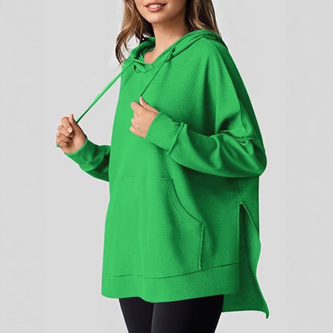 Oversized women's hoodie with side slits and practical pockets Lune London