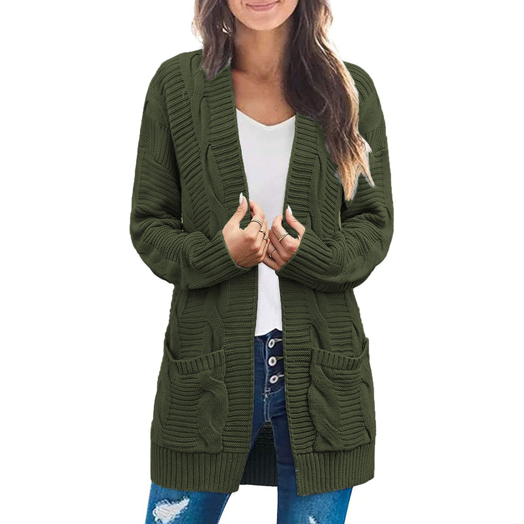 Ladies chunky knit cardigan with elegant cable patterns and practical pockets Lune London