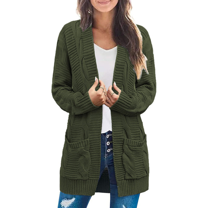 Ladies chunky knit cardigan with elegant cable patterns and practical pockets Lune London