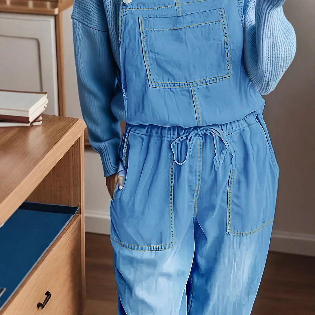Women's overall jumpsuit made of lightweight denim with a drawstring waistband, patch pockets, and turned-up hem Amarae
