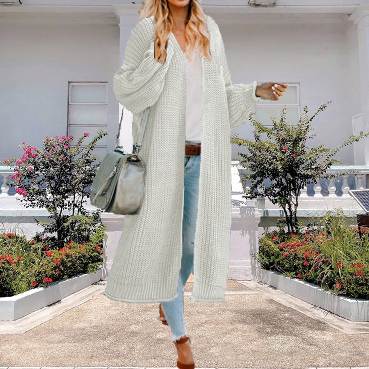 Women’s knit coat with open design and voluminous sleeves Lune London