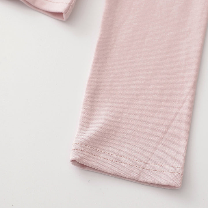 Women's long sleeve shirt with V-neck, button placket and check trim Amarae