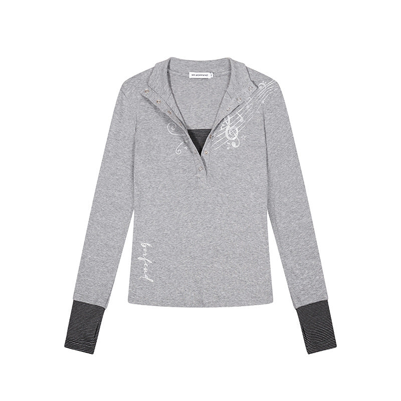 Women’s long-sleeve shirt with Henley button placket, contrast cuffs, and music note print Amarae