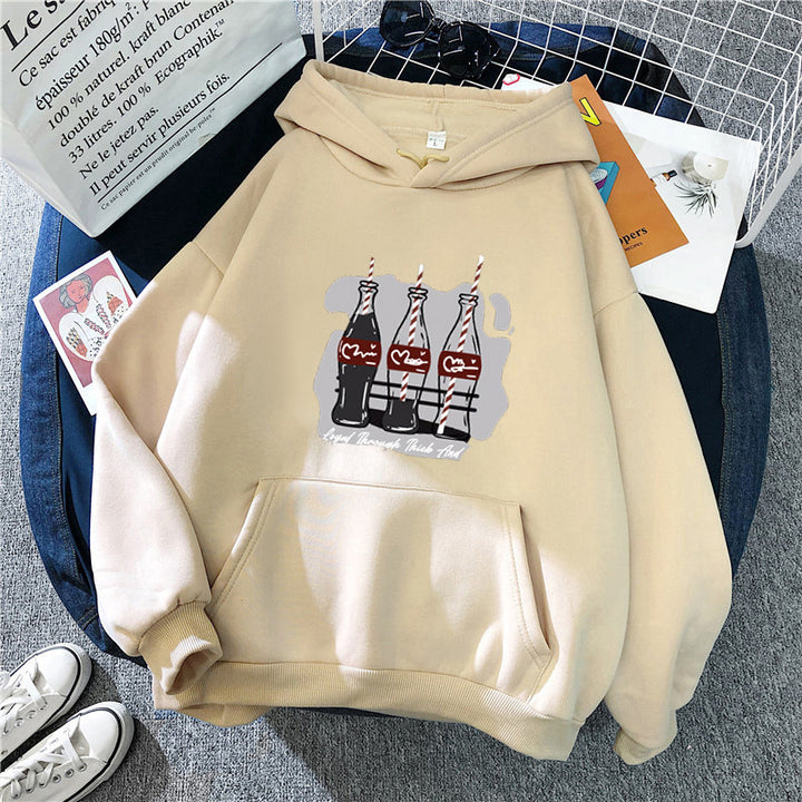 Women's hooded sweatshirt with playful Coca-Cola bottle motif Chic & Stil