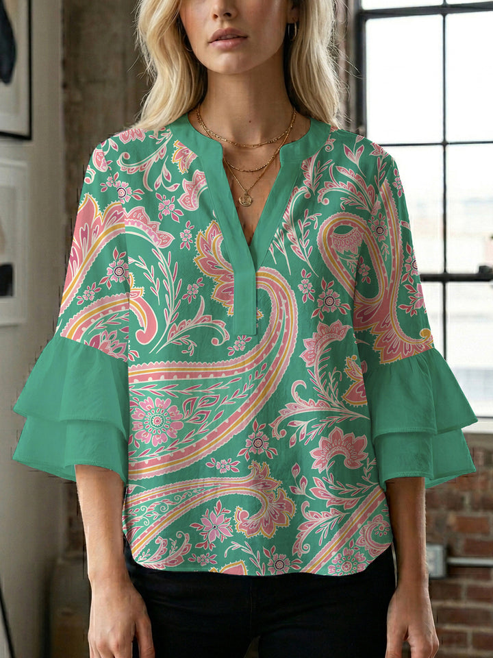Ladies elegant top with voluminous ruffle hems and floral design Lune London