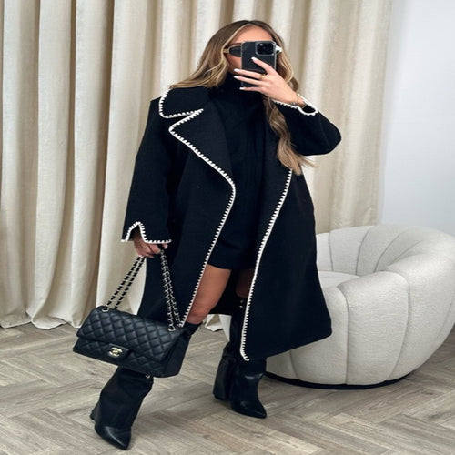 Elegant coat for women with a stylish clutch collar and contrasting decorative seams Amarae