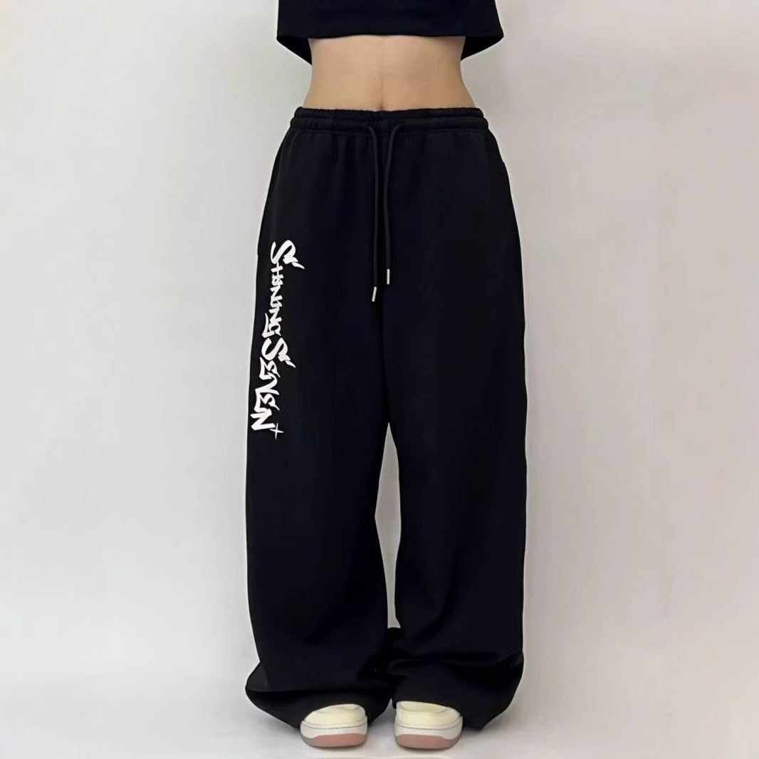 Women's casual jogging pants with a wide cut and sport graphic Chic & Stil