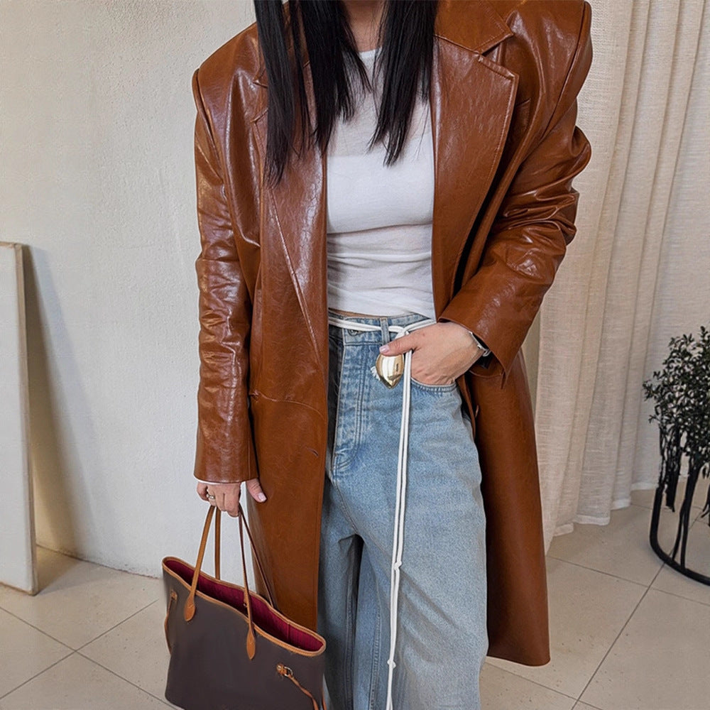 Women's long-cut patent leather trench coat with lapel collar and boxy oversized fit Amarae