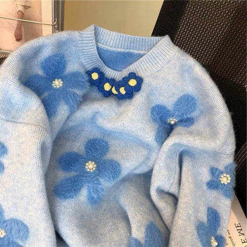 Pull en tricot pour femmes avec des appliqués floraux et des détails en perles Chic & Stil