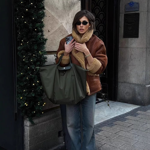 Faux fur jacket for women with a fitted cut and practical pockets Amarae
