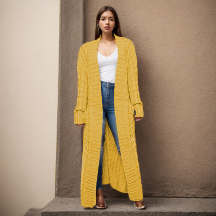 Women Thick knitted cardigan with a refined cable design and practical pockets Lune London