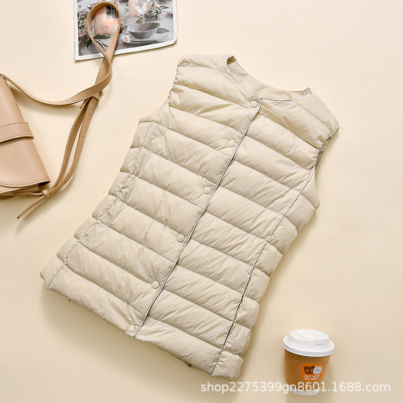 Women's sleeveless quilted thermal vest with round neck and snap button placket Amarae
