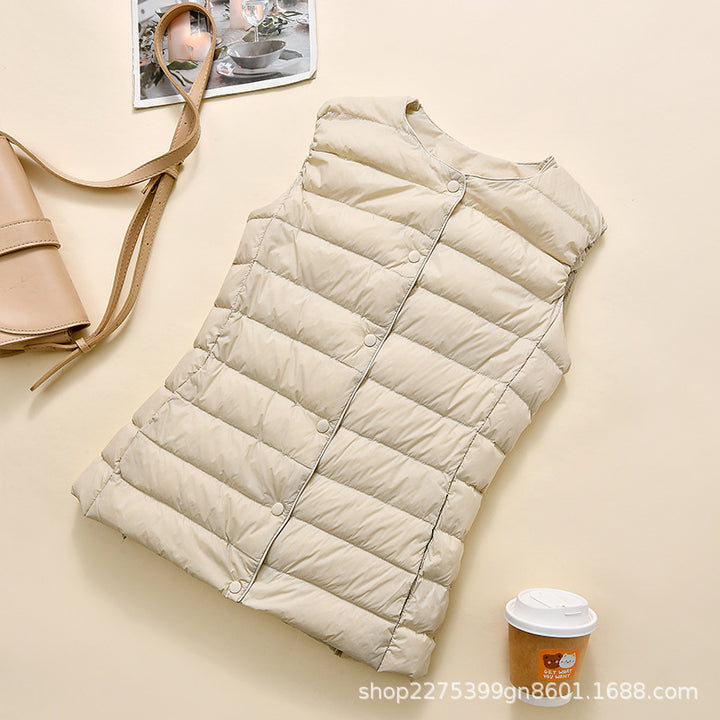 Women's sleeveless quilted thermal vest with round neck and snap button placket Amarae