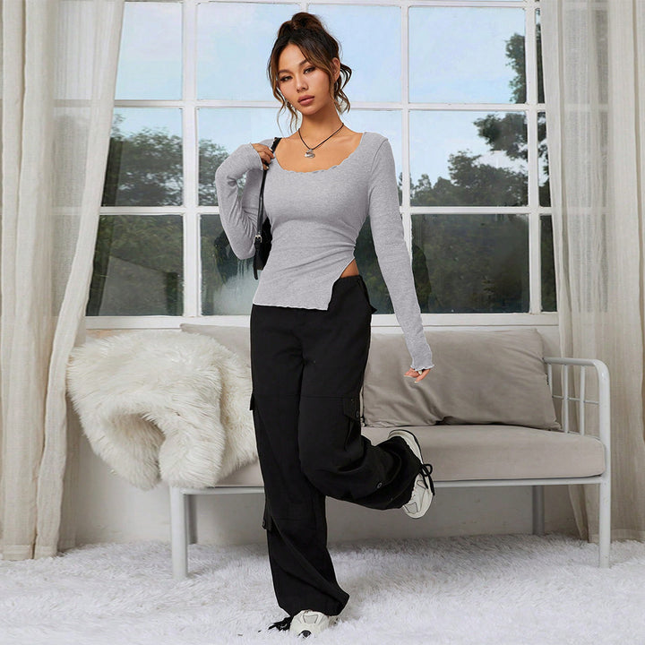 T-shirt ajusté femme à manches longues avec ourlet asymétrique et décolleté élégant Chic & Stil