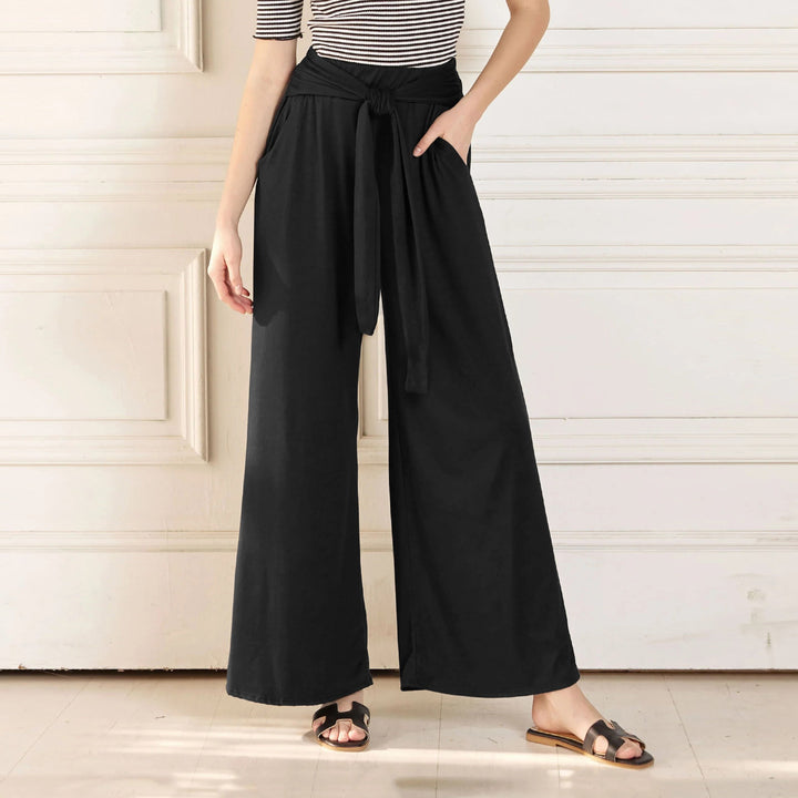 Loose jersey pants for women with a tie belt and high waist Lune London